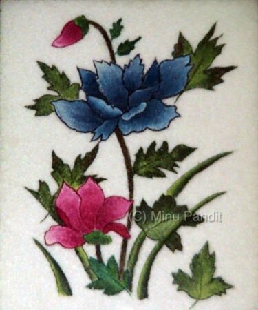 Colorful floral illustration with blue and pink flowers and green leaves.