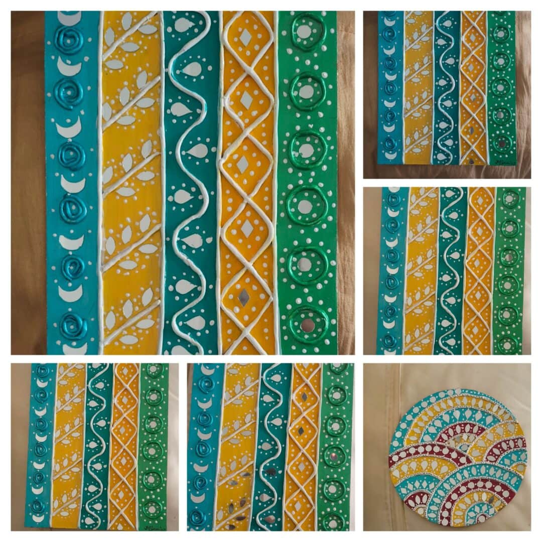 Colorful traditional Indian wall and plate decor with intricate patterns.